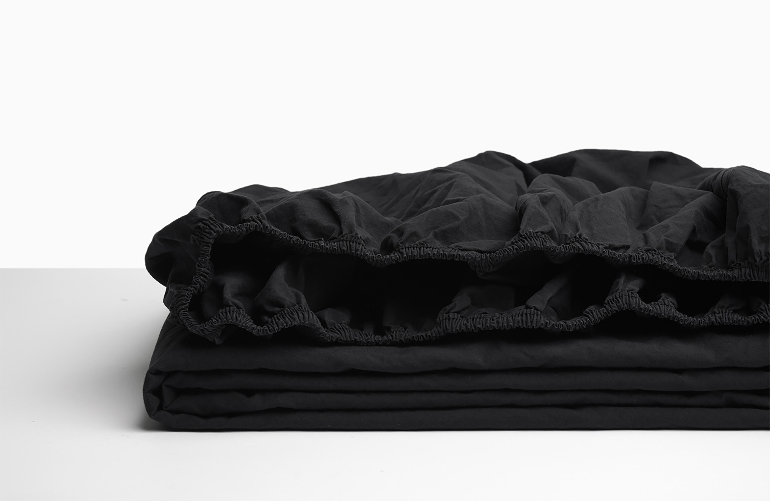 Sábana bajera wash grament percal 200 hilos negro para cama de 105 cm