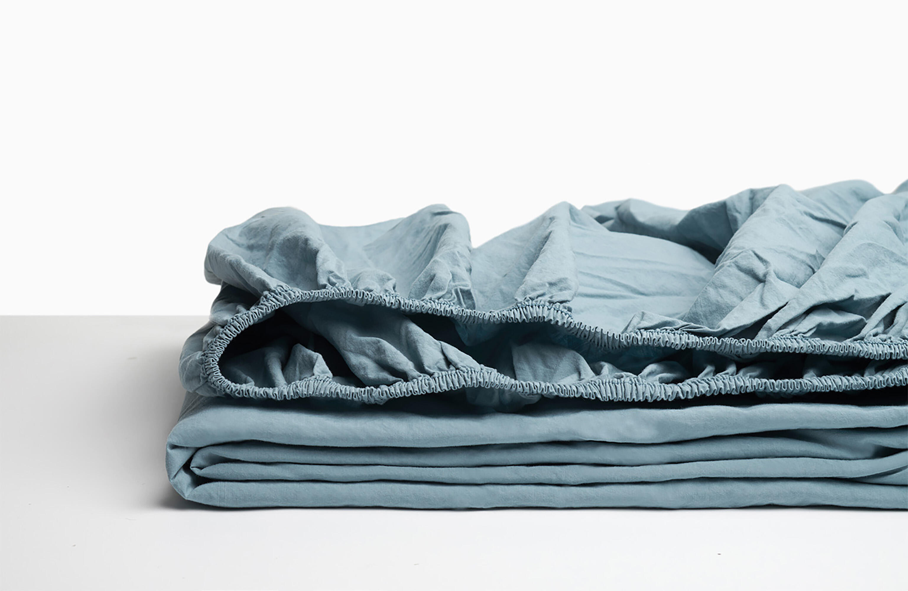 Sábana bajera wash garment percal 200 hilos azul cielo para cama de 135 cm