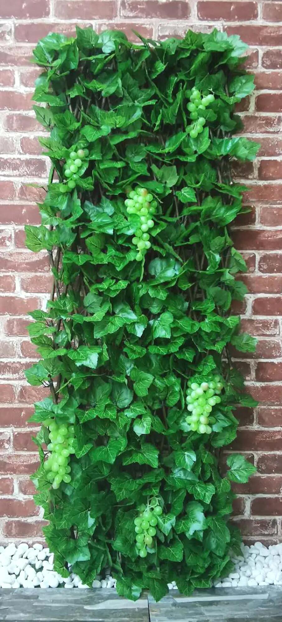 Celosía extensible de poliéster verde parra con uvas 100x150 cm