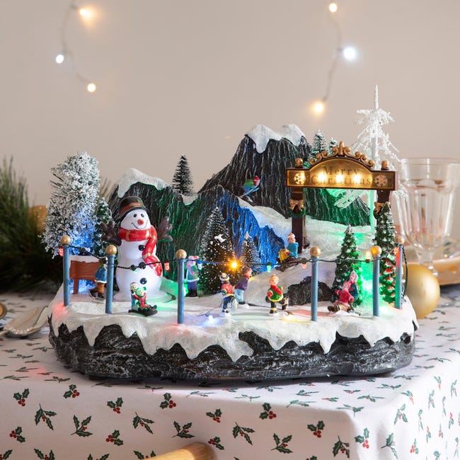 Paisaje animado de Navidad con iluminación LED y música con monigote de  nieve | Leroy Merlin