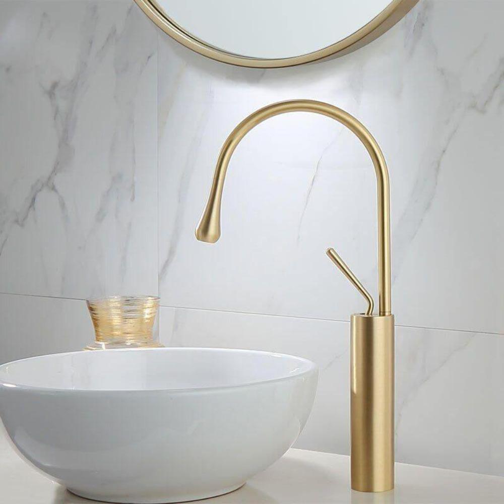 Grifo para lavabo de 14,8 cm de altura con acabado en colores blanco y  dorado Rubio Laveo