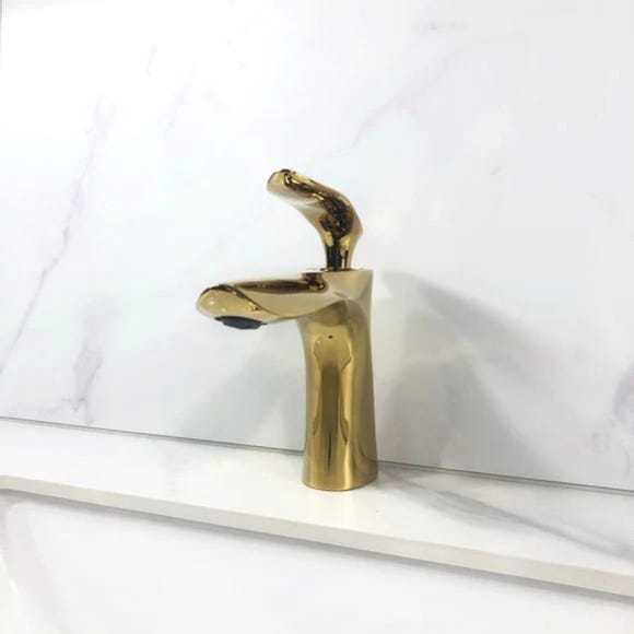 GRIFO DE ENCIMERA PARA LAVABO EN LAT N DORADO COLECCI N SCAMANDRE