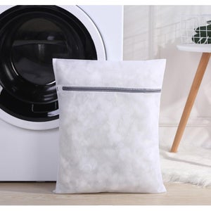 Acheter ICI une protection pour machine à laver avec pochettes
