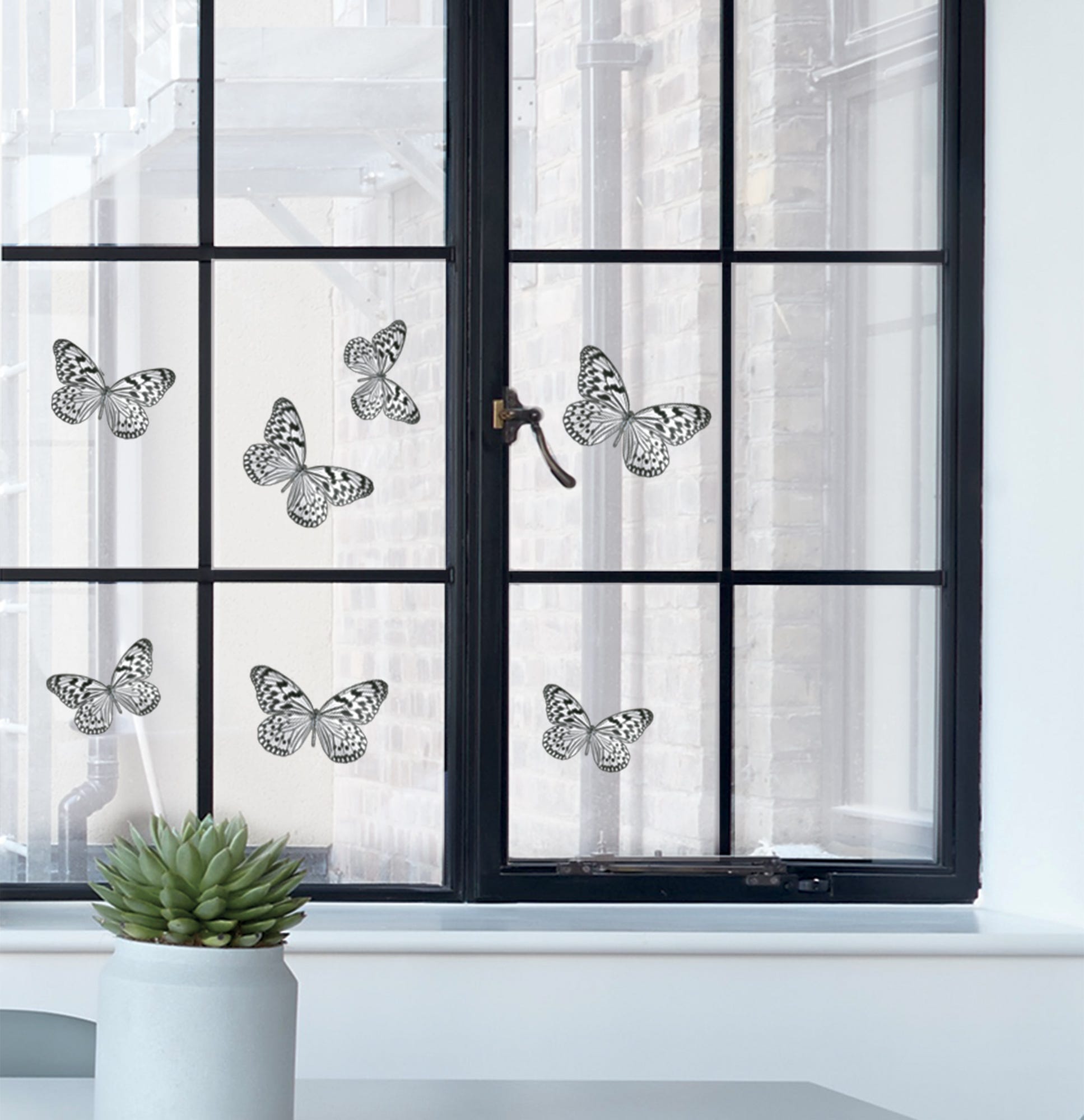 Sticker électrostatique pour vitre, papillons noirs et blancs pour