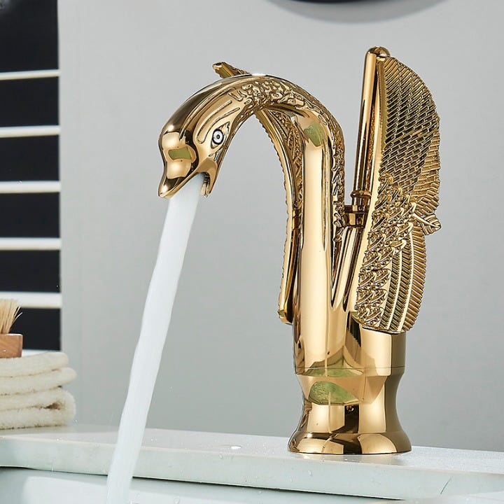 Robinet de vasque design original finition or avec poignée - Swan