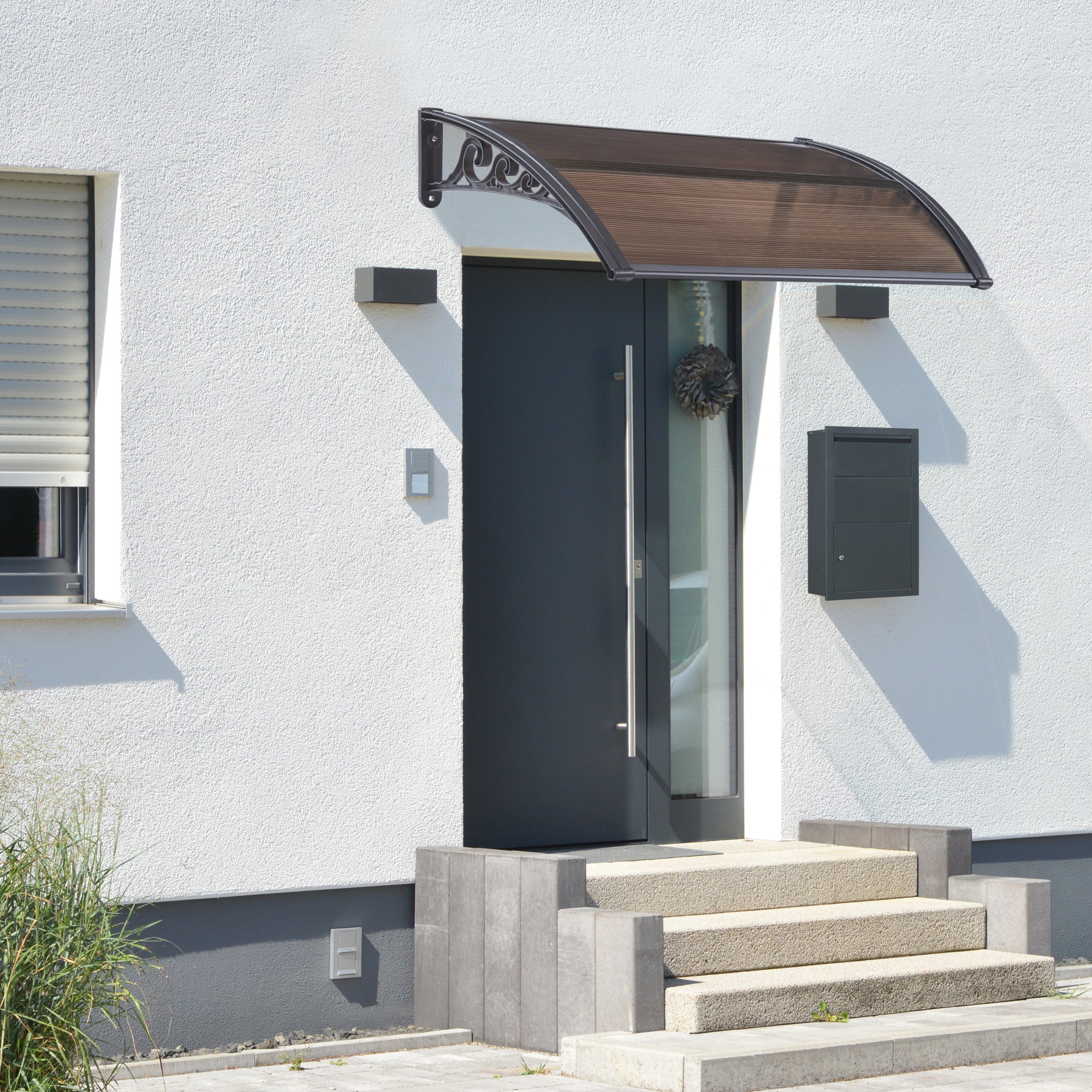 Marquesina exterior para Puertas Mellerud protección policarbonato /  plástico 120 x 80 cm - Negro y Marrón [en.casa]