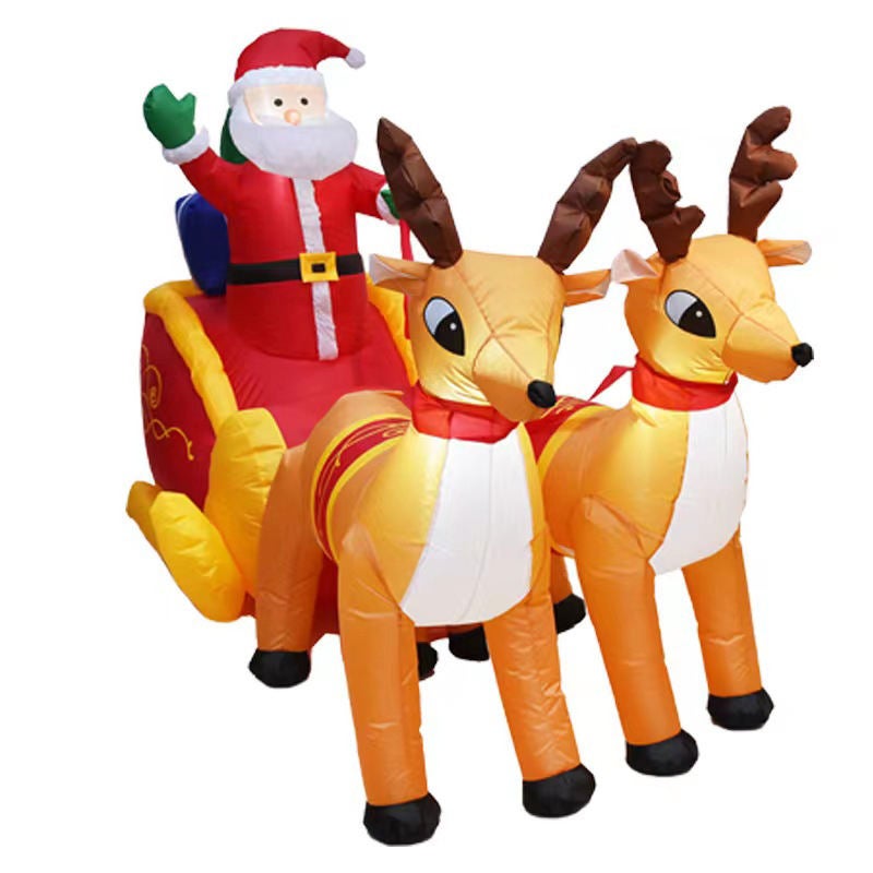 Père Noël gonflable lumineux sur son traîneau avec trois rennes et