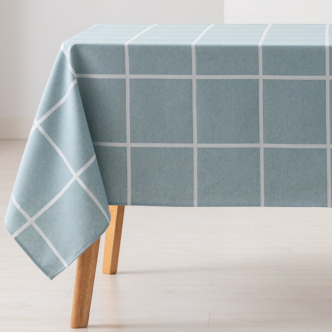 Mantel antimanchas rectangular jacquard 140x180cm, tacto tela, caída natural, algodón combinado diseño a cuadros grandes frame color agua marina