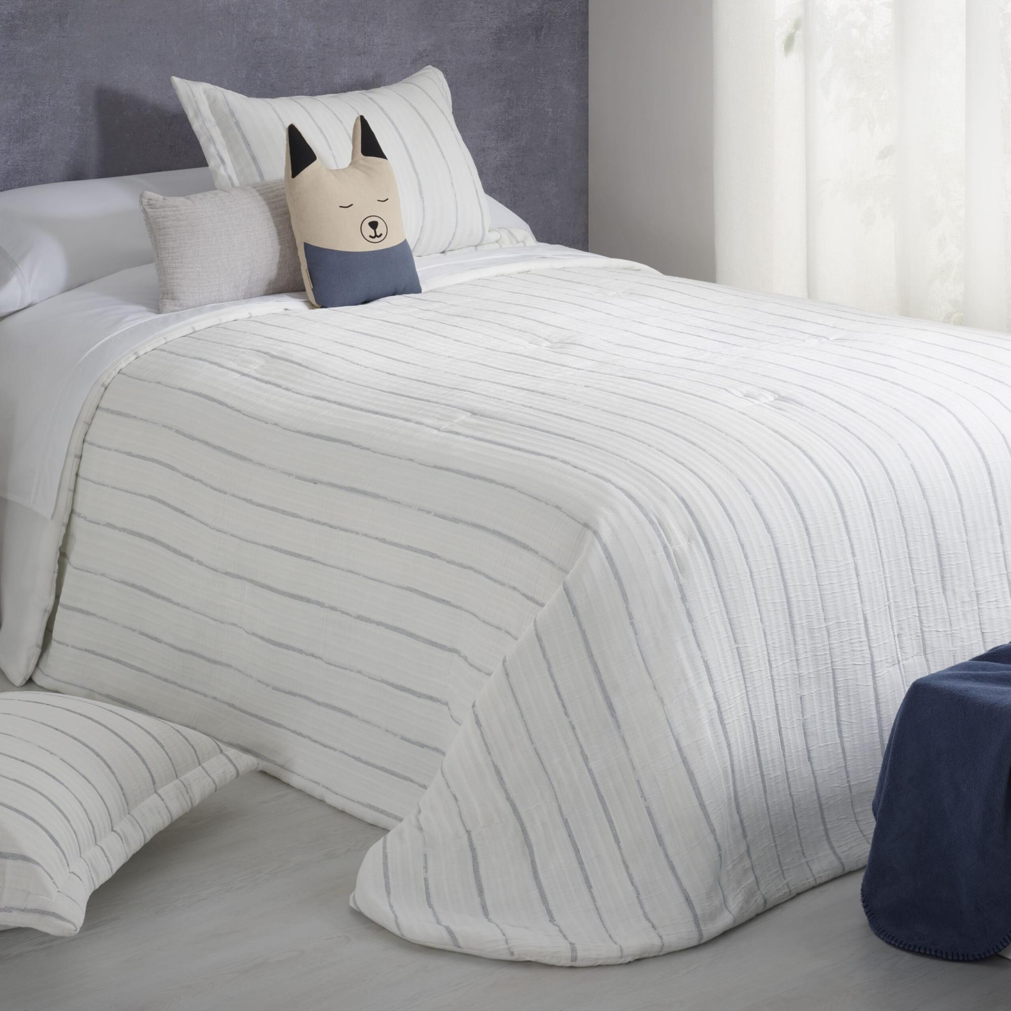 Colcha bouti jacquard y funda de cojín arte blanco cama 105 cm donegal collections