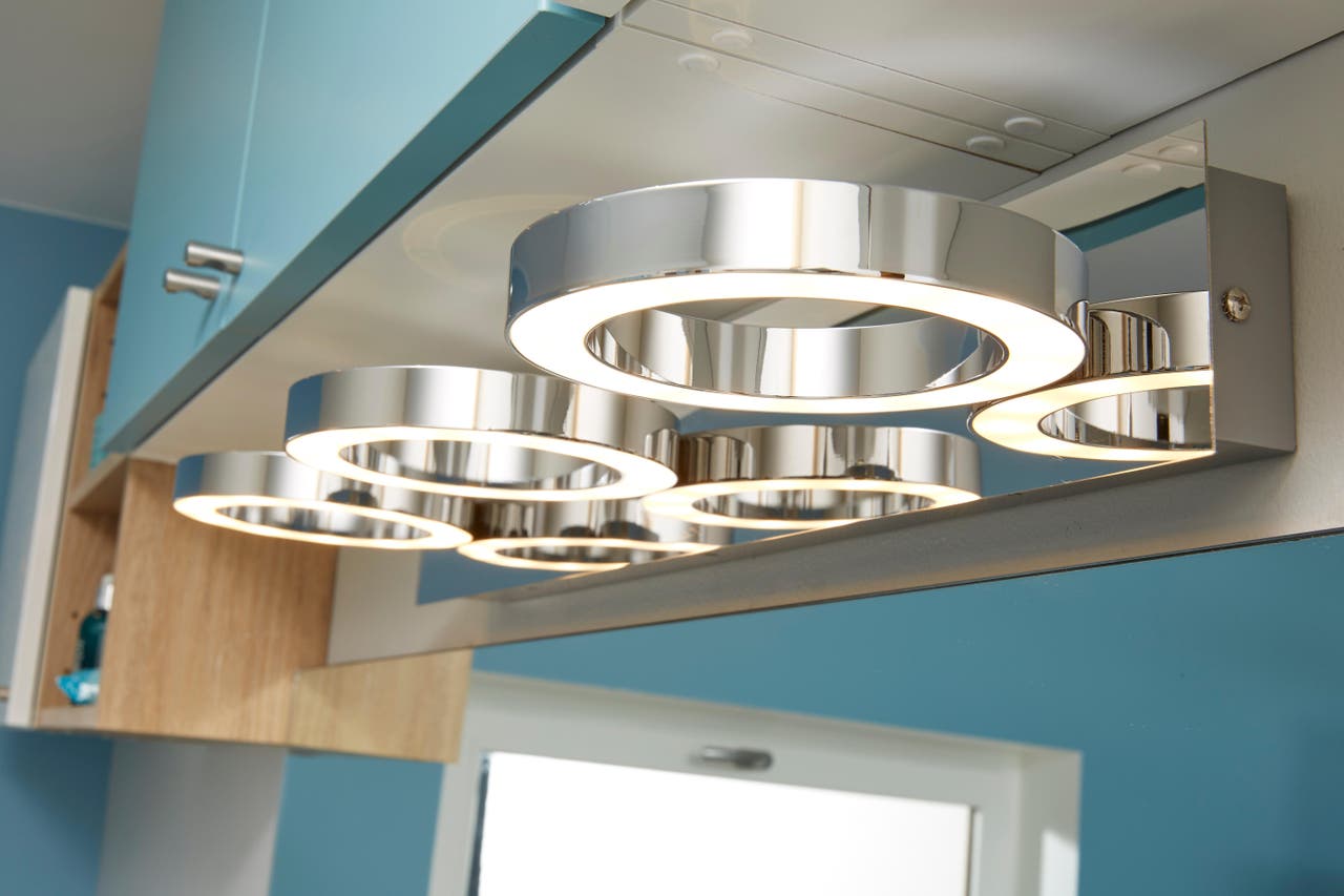 Diapositive Une applique avec des cercles de led pour une touche design