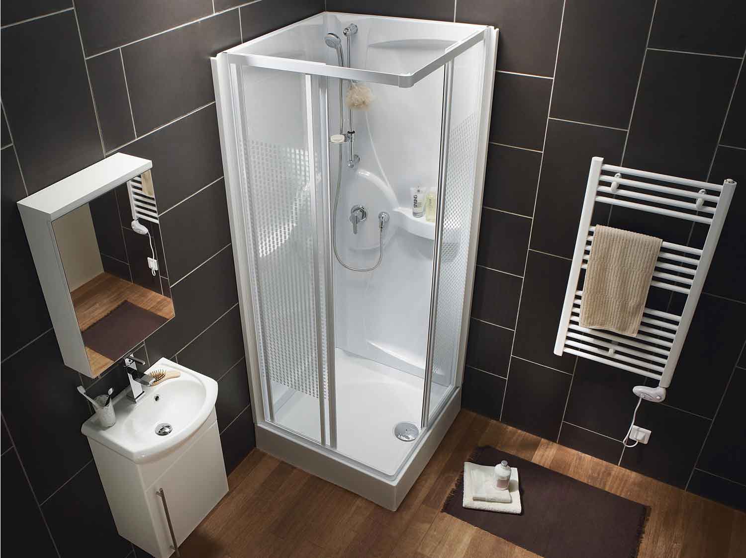 toilettes et détail d'une cabine de douche d'angle avec fixation