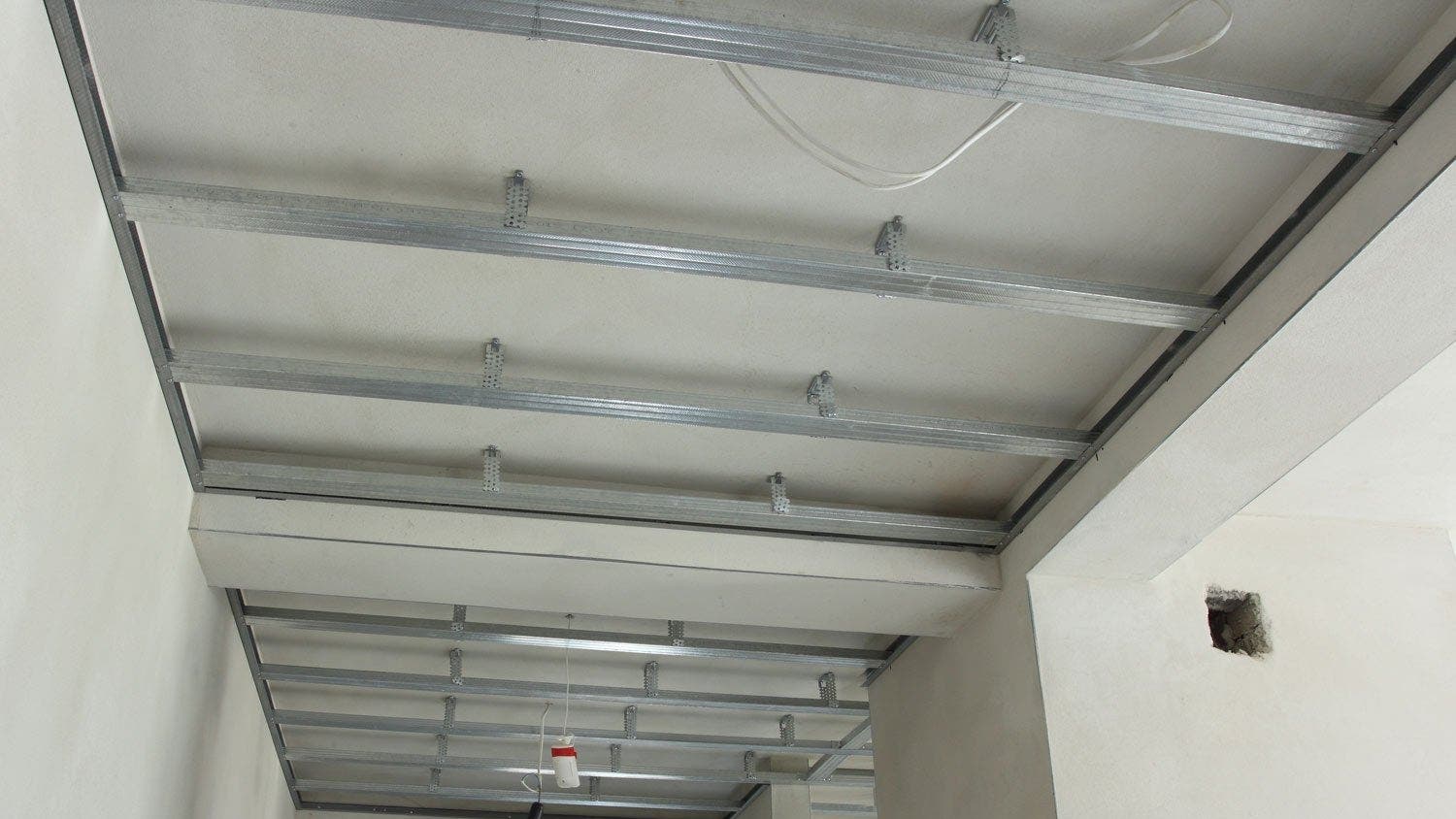 Plafond Rigitone® pour l'isolation phonique plafond l Placo®