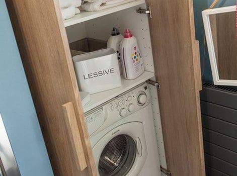 photo d'un lave linge dans une salle de bains