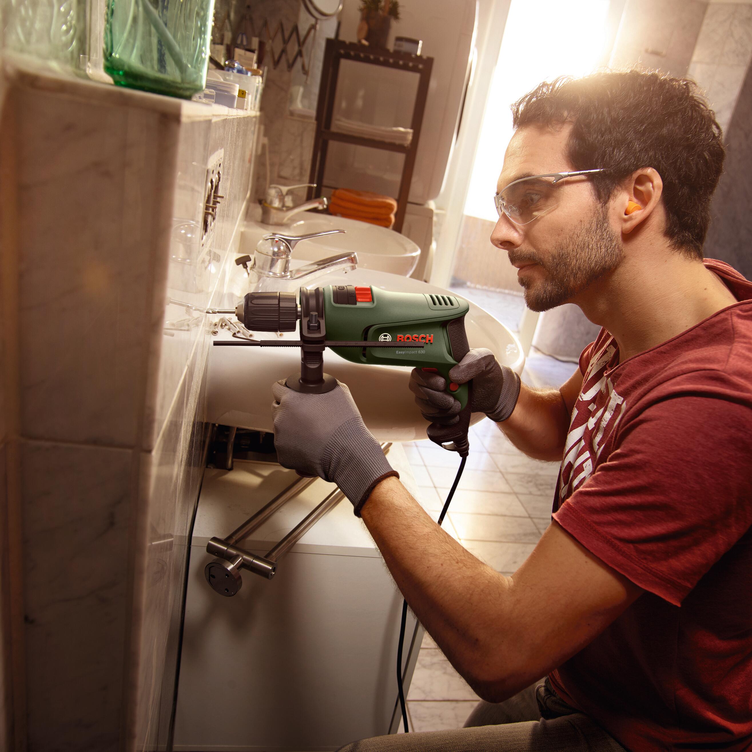 Trapano a percussione a filo BOSCH EasyImpact  + valigetta in plastica - 4