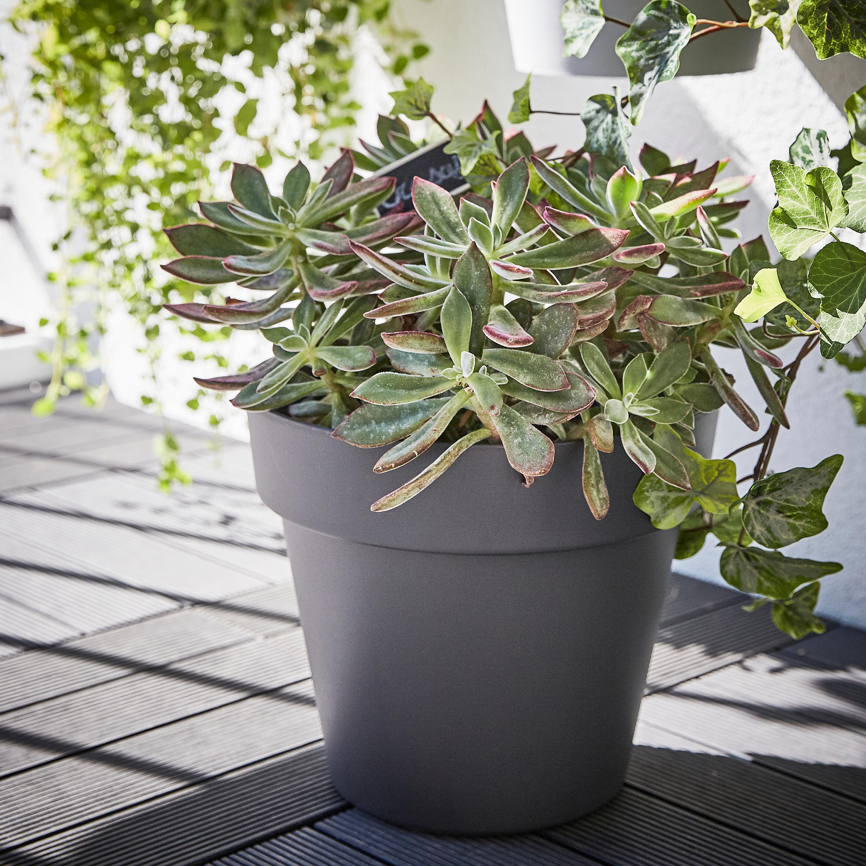 Baldosa composite 30 x 30 cm y 23 mm gris naterial