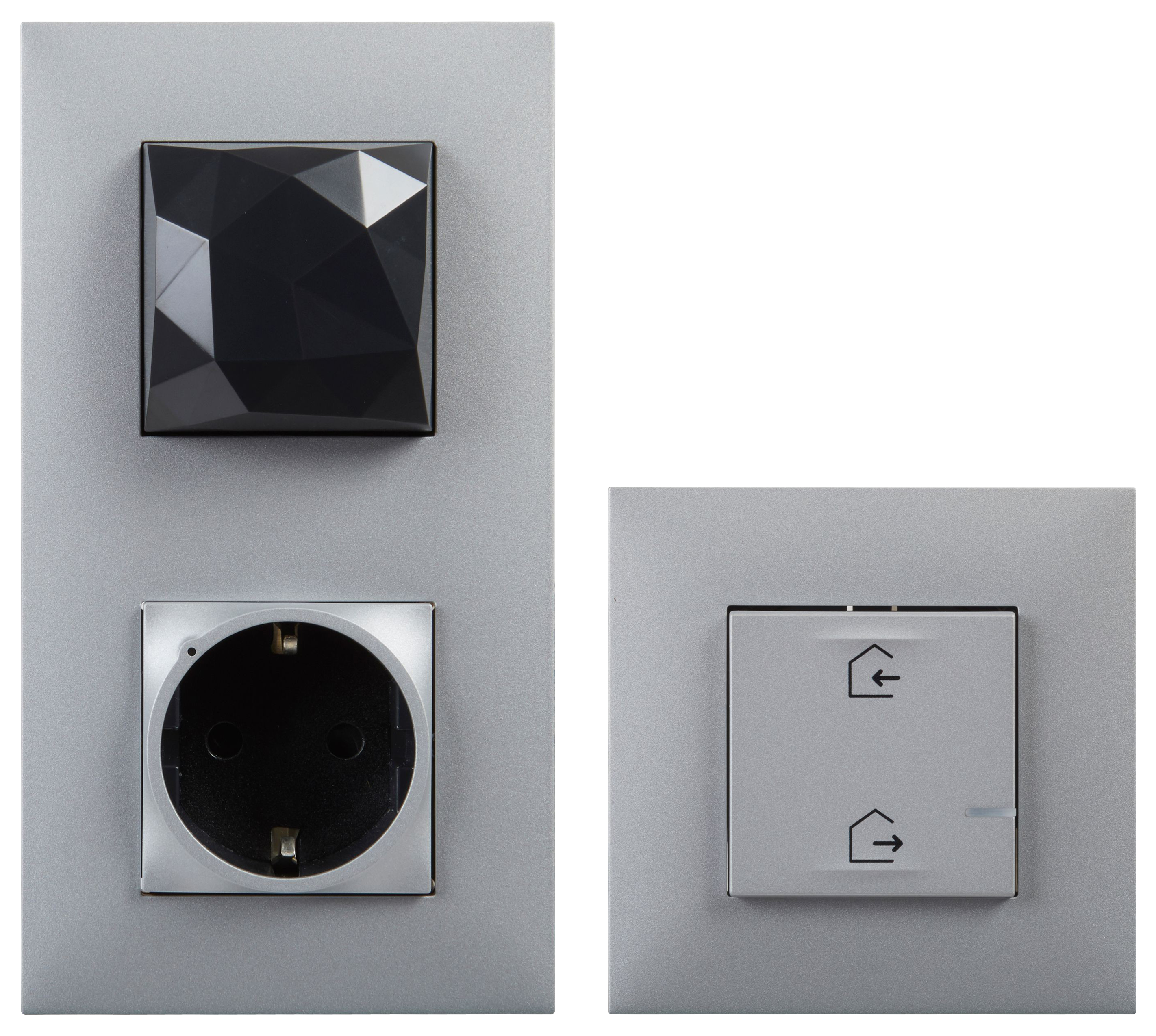Interruptores de luz modernos en negro sobre pared blanca