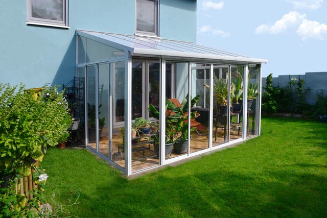 marquise utilizada para jardim de inverno