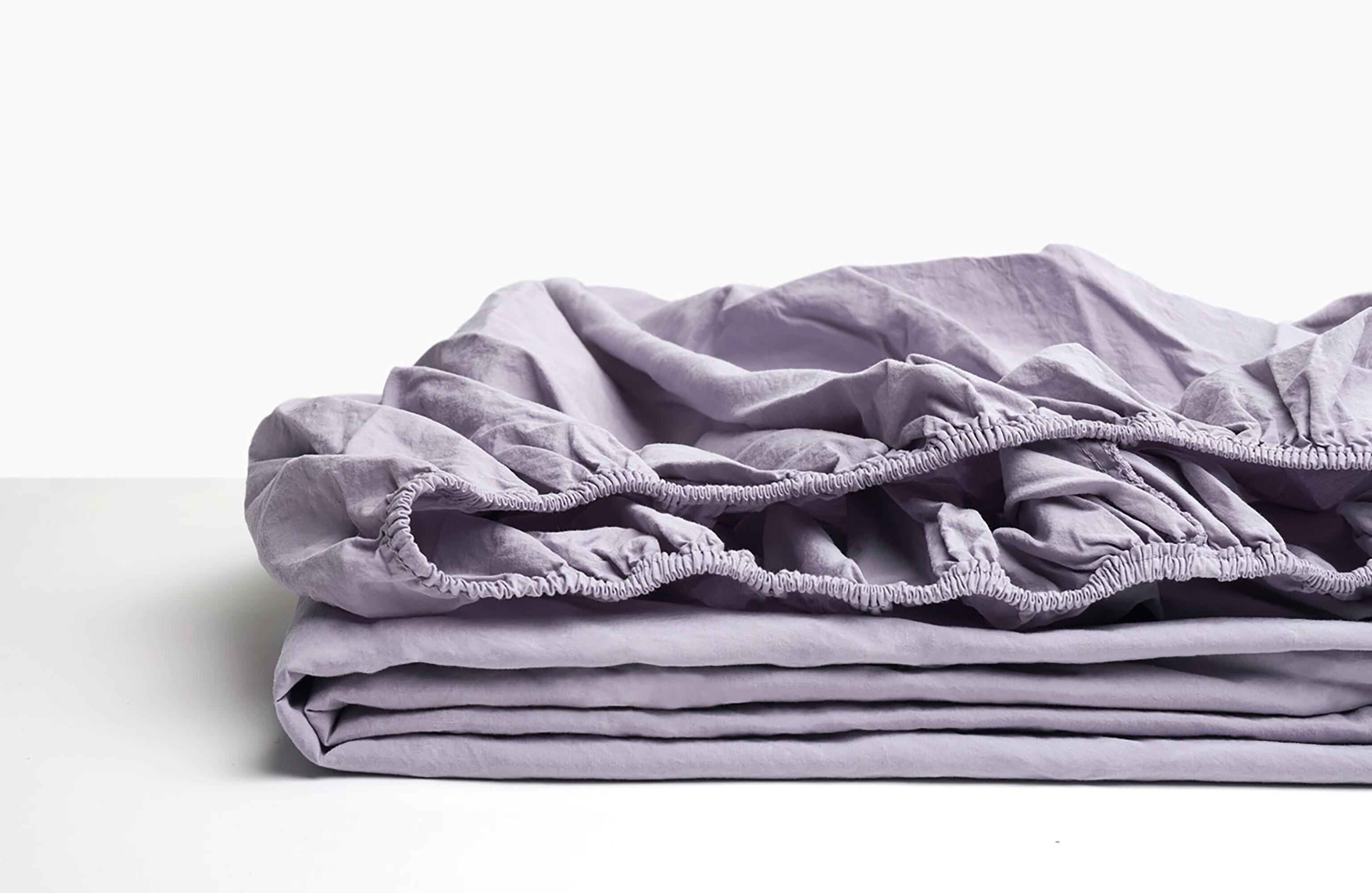Sábana bajera wash garment percal 200 hilos azul lavanda para cama de 135 cm