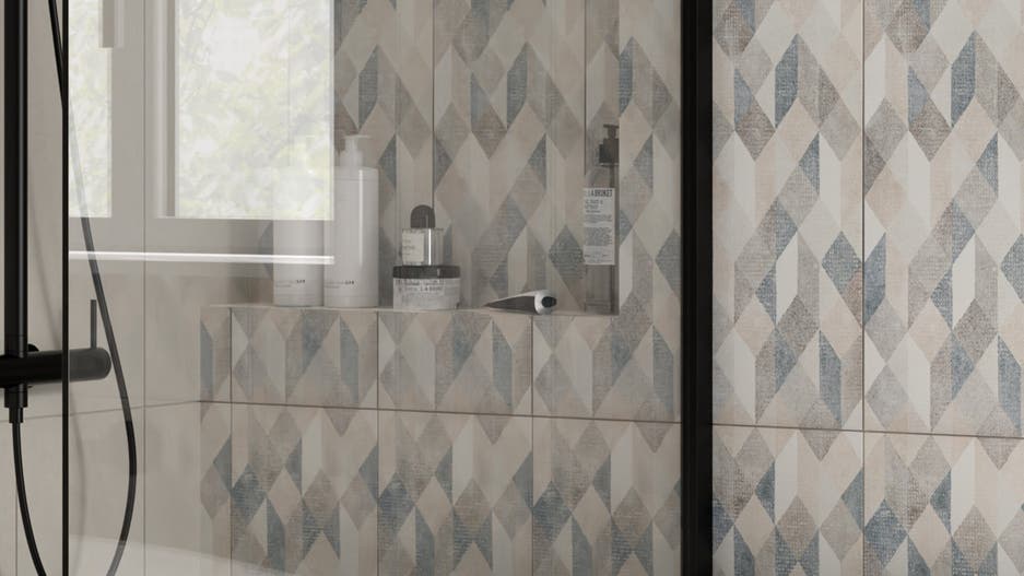bagno azzurro e grigio dallo stile grafico
