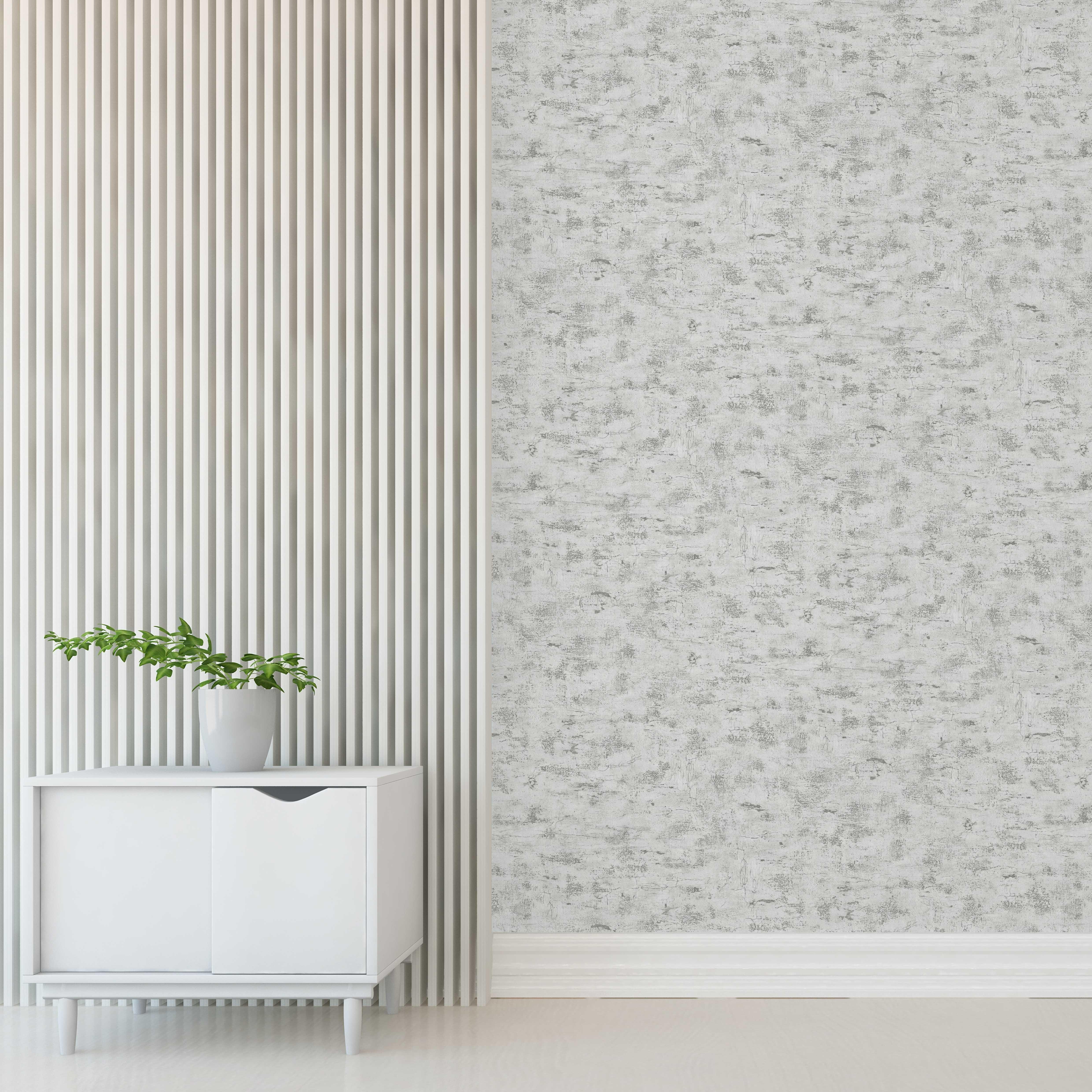 Papel pintado vinilo imitación material argamasa gris