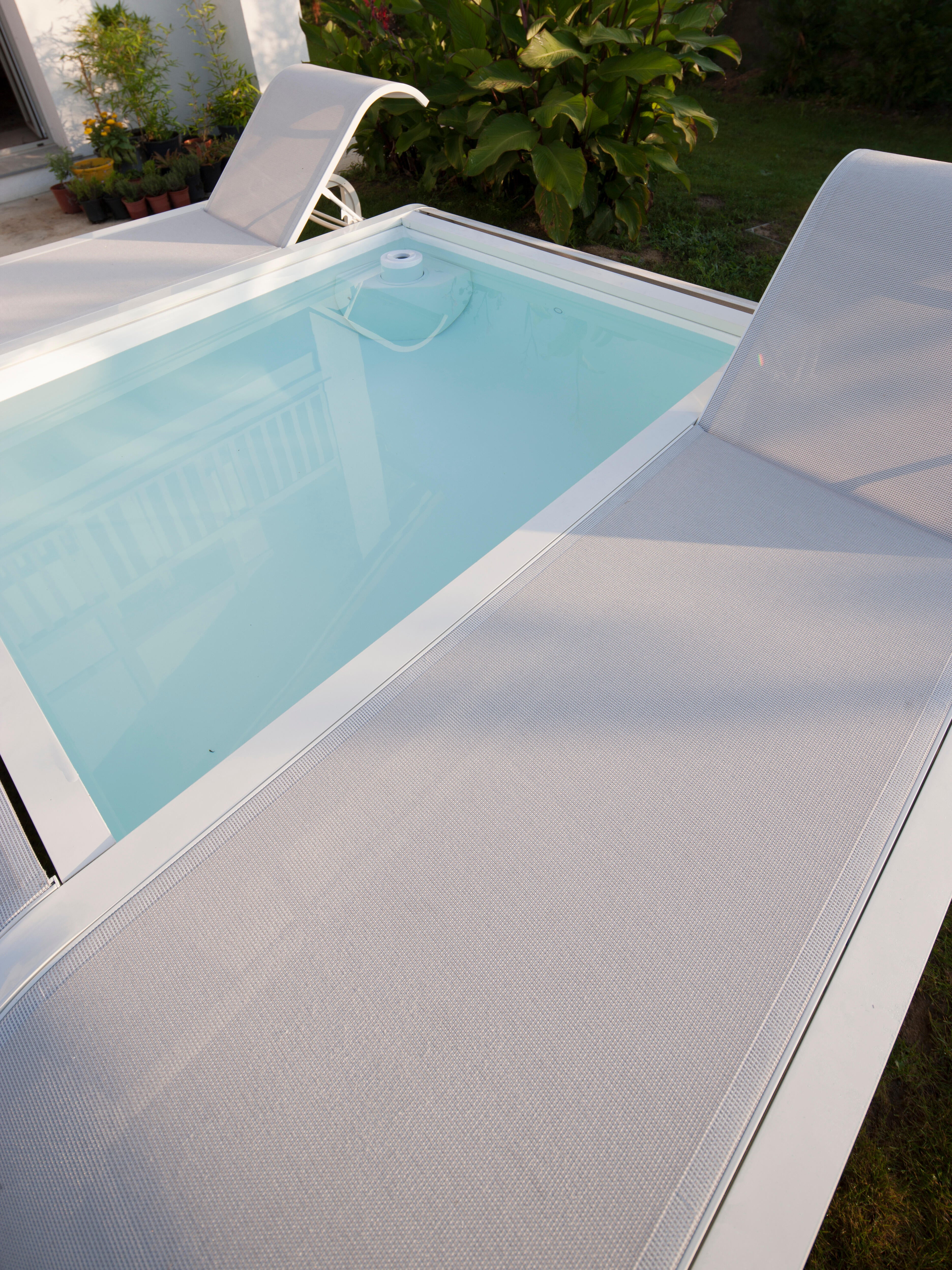 Piscina elevada de acero blanco rectangular 2.82x2.19x0.6 m con depuradora de cartucho GRE - 23