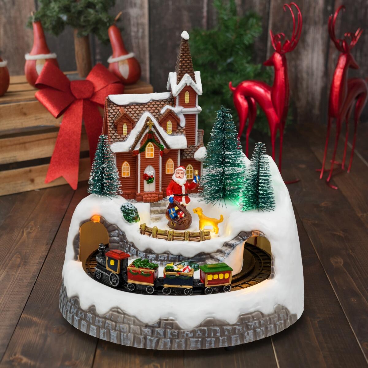 Villaggio di Natale Babbo e cane H 21.5 cm - 2