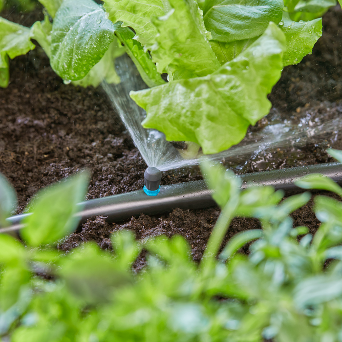 Système d'aspersion GARDENA couvrant une zone de 90°.