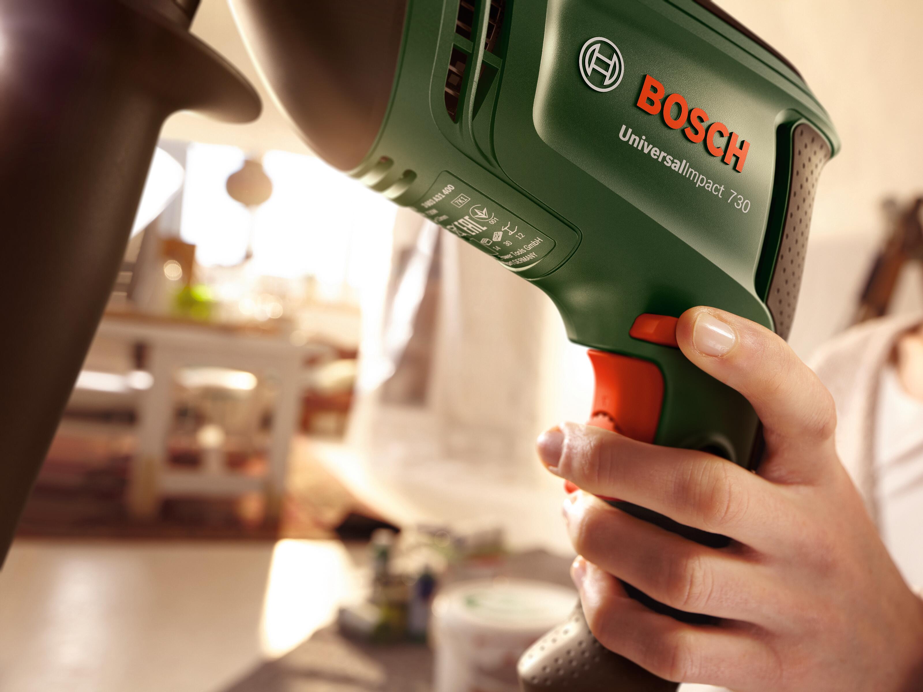 Trapano a percussione a filo BOSCH Universal Impact 730W in valigetta in plastica - 2
