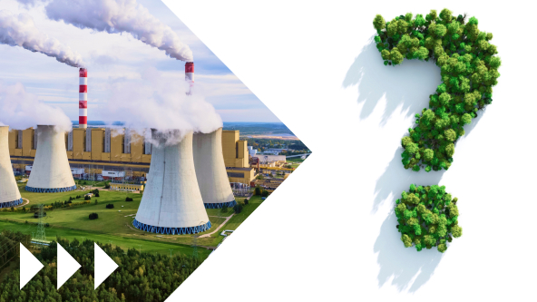 Zdjęcie przedstawiające fabrykę, kominy z dymem