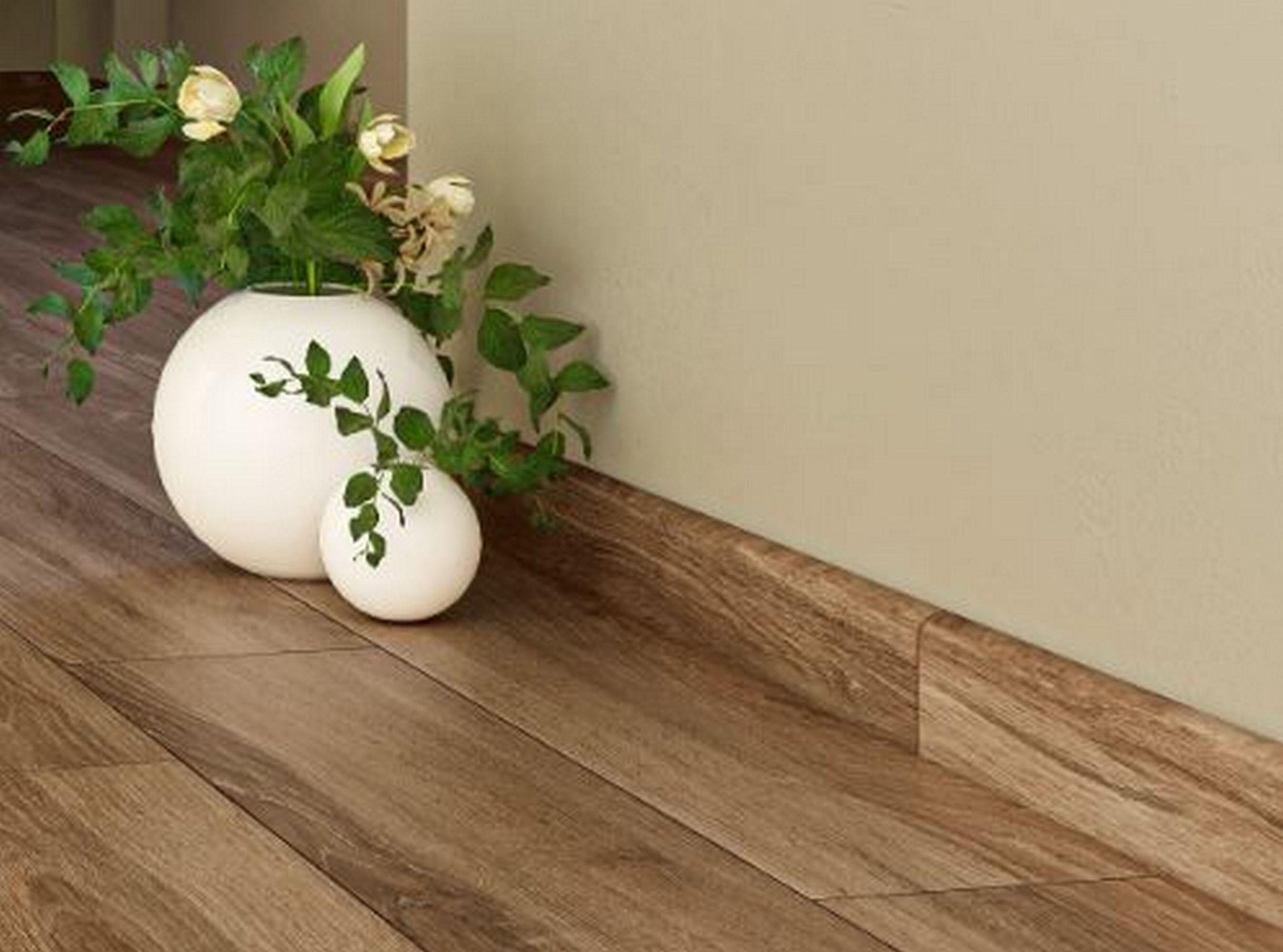 Suelo porcelánico ipanema efecto madera taupe 20x75 cm c3 artens