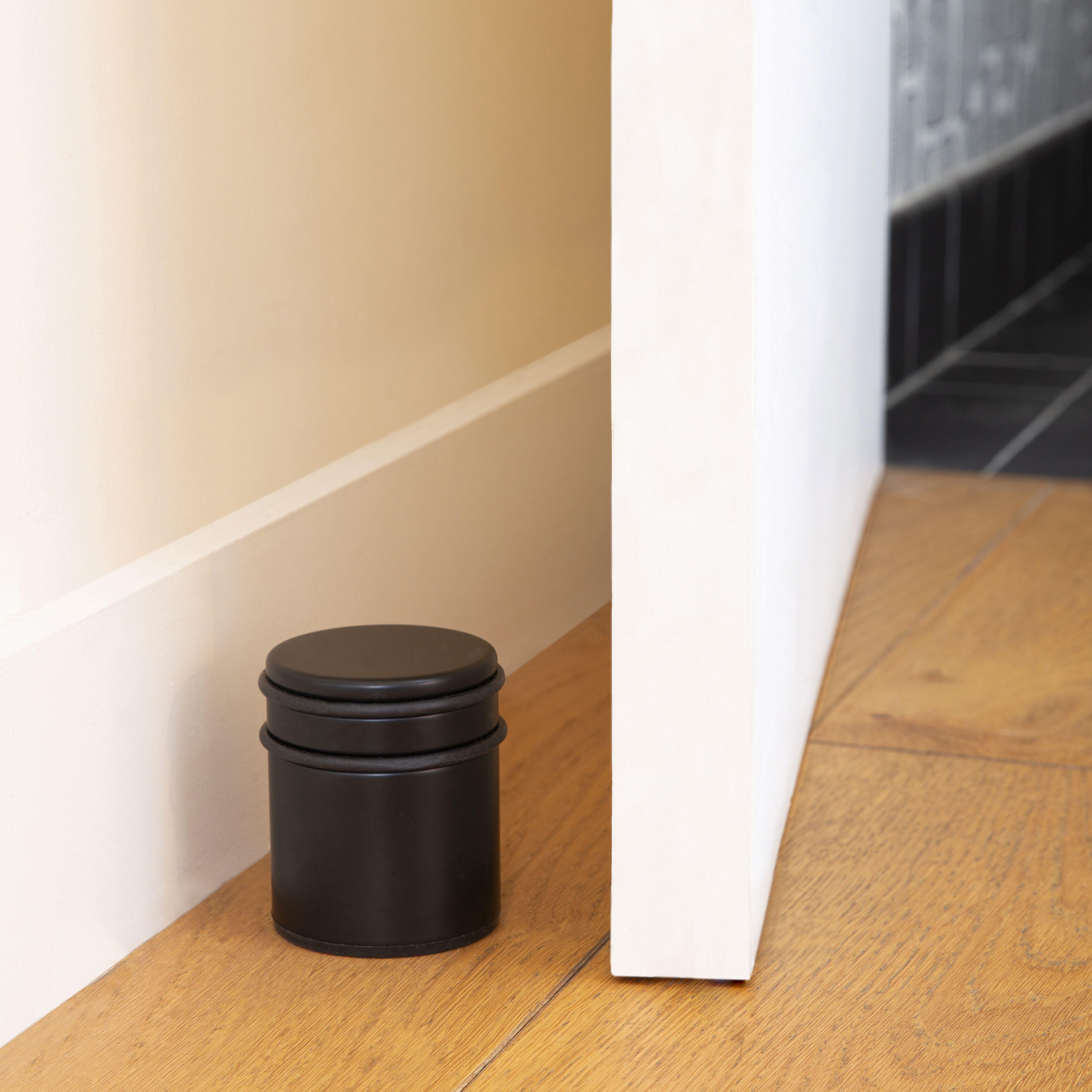 TOPE PARA PUERTAS DE ACERO RETENEDOR PINTADO NEGRO - 4