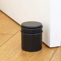 TOPE PARA PUERTAS DE ACERO RETENEDOR PINTADO NEGRO - 3