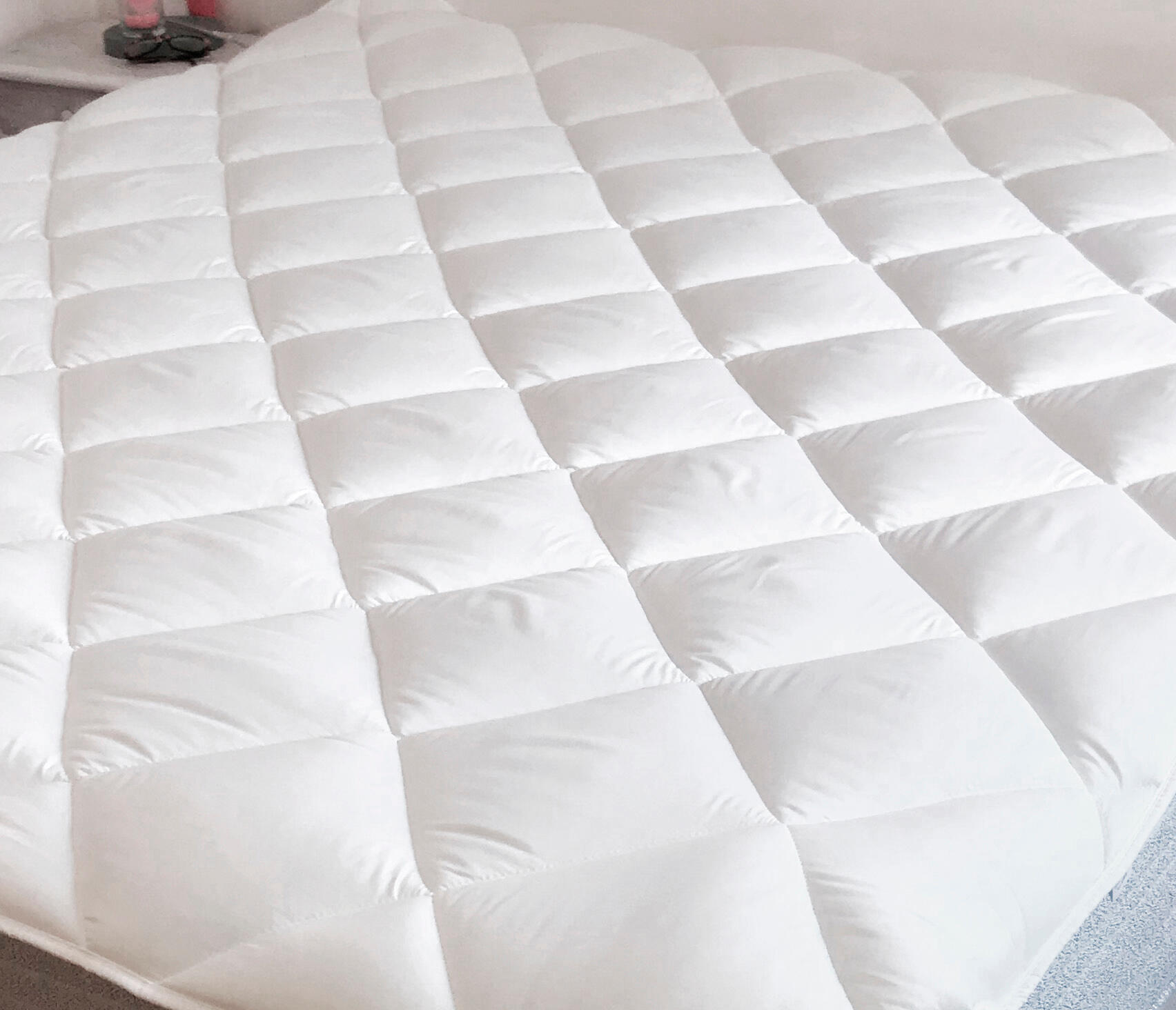 Protector de colchón impermeable  TOPPER para cama de 105 cm - 3