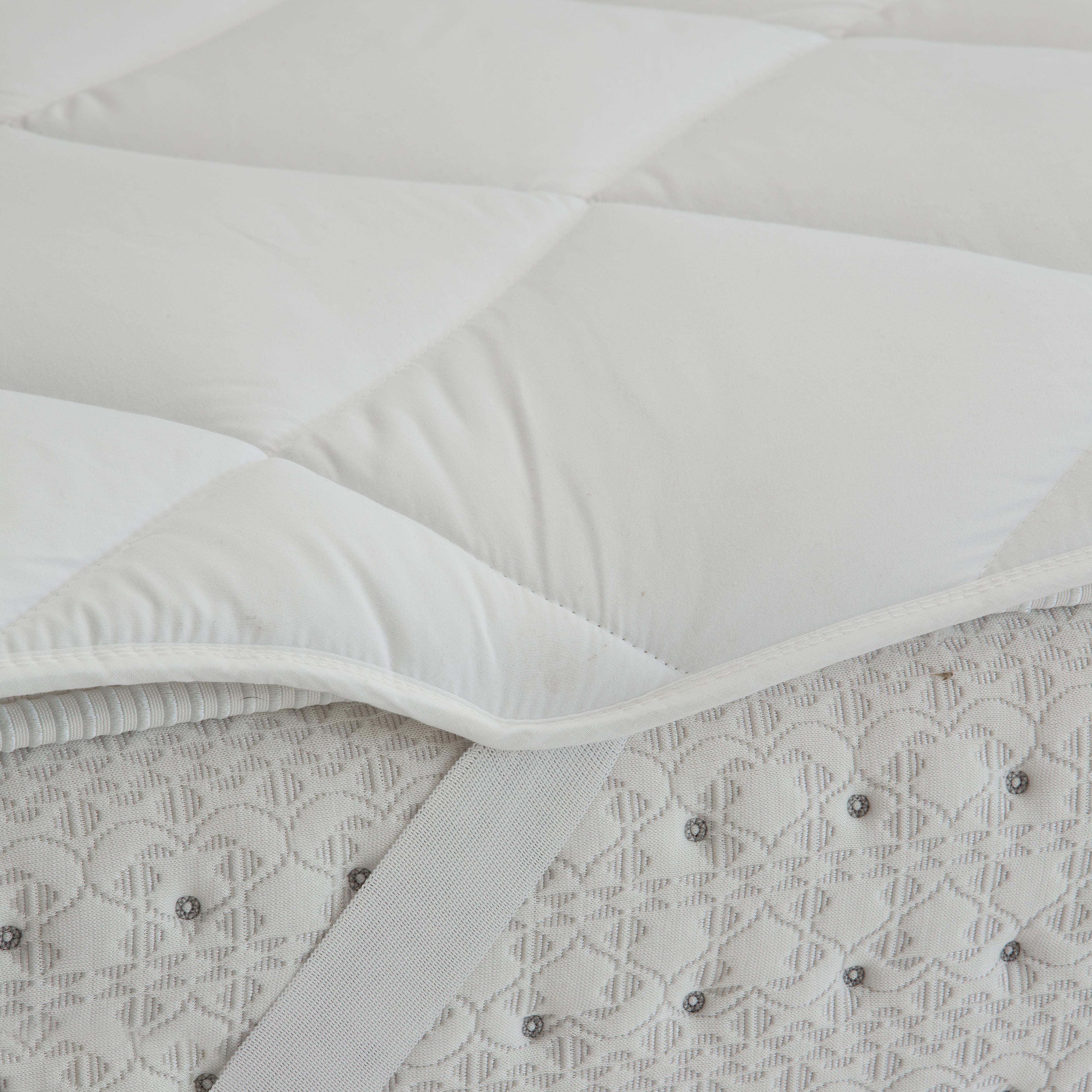 Protector de colchón impermeable  TOPPER para cama de 105 cm - 2