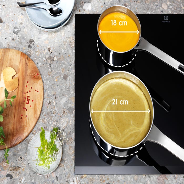 Table de cuisson électrolux avec foyer qui s'adaptent aux récipients