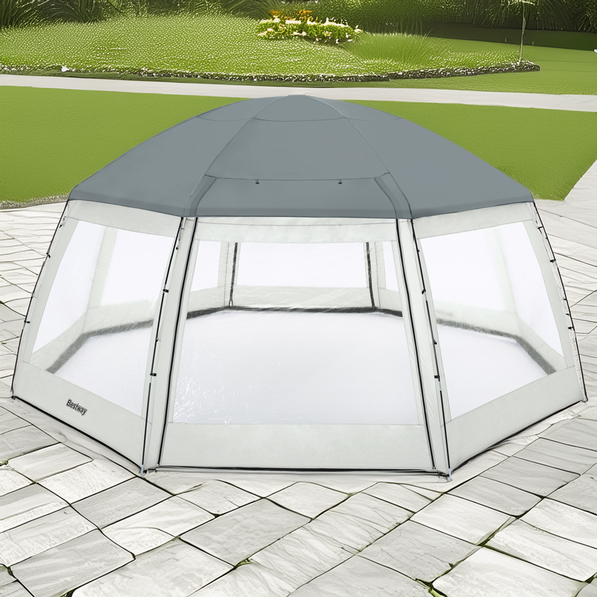 Pawilon / namiot Bestway do basenów o wymiarach 600x600x295 cm, w kolorze szaro-białym, ustawiony na brukowanym podłożu, z kopułowym dachem i siatkowanymi ścianami zapewniającymi wentylację i ochronę przed owadami, w tle widoczny trawnik i rabata z roślinami. - 0