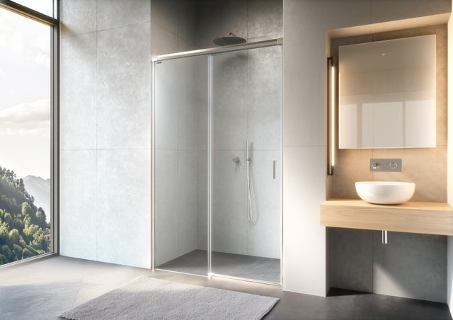 Mampara de ducha corredera 1 hoja fija + 1 puerta corredera Prisma. Perfil aluminio plata. Ancho adaptable (115-120)x200 cm Cristal templado de seguridad transparente 6mm. Cierre magnético. Sin guía inferior Duscholux