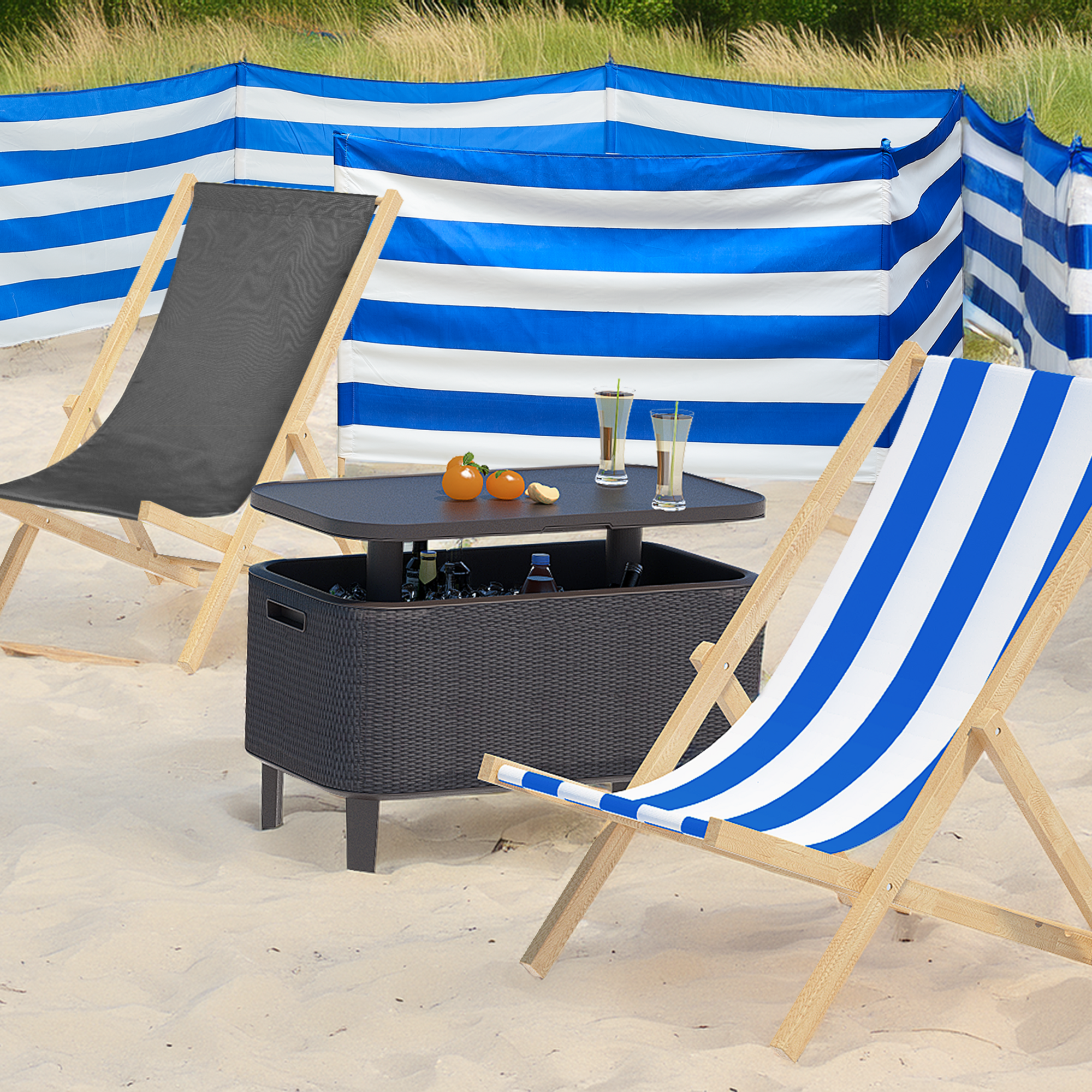 Leżak antracytowy Ołer Garden na plaży obok stolika.