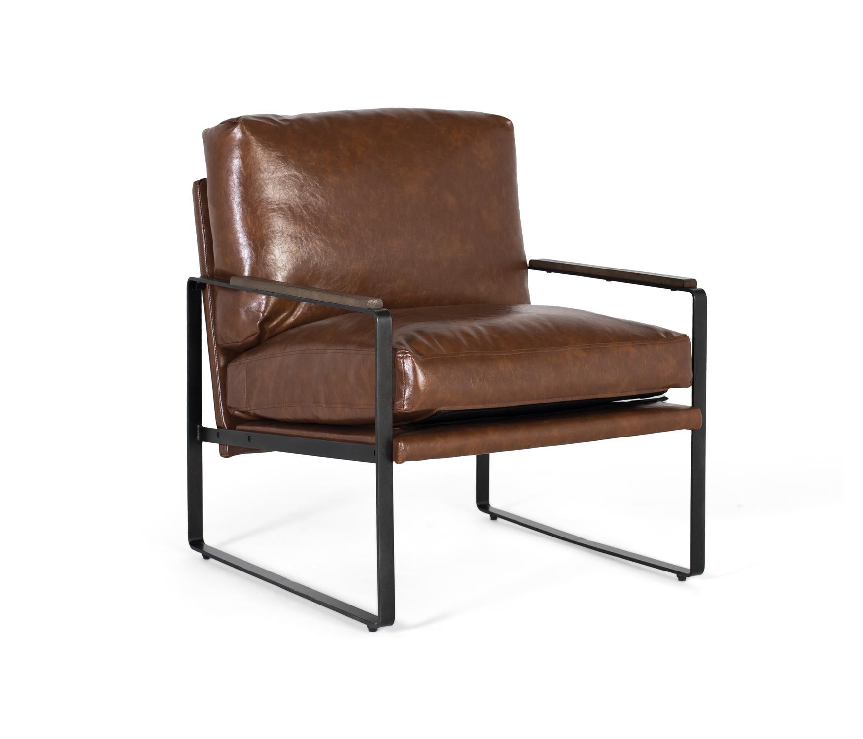 Fauteuil industriel en fer noir et simili cuir brun vieilli
