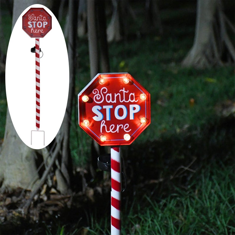 Świąteczna atmosfera słoneczna na zewnątrz, lampki dekoracyjne, lampki trawnikowe bożonarodzeniowe, ciepłe światło, panel odpoczynku