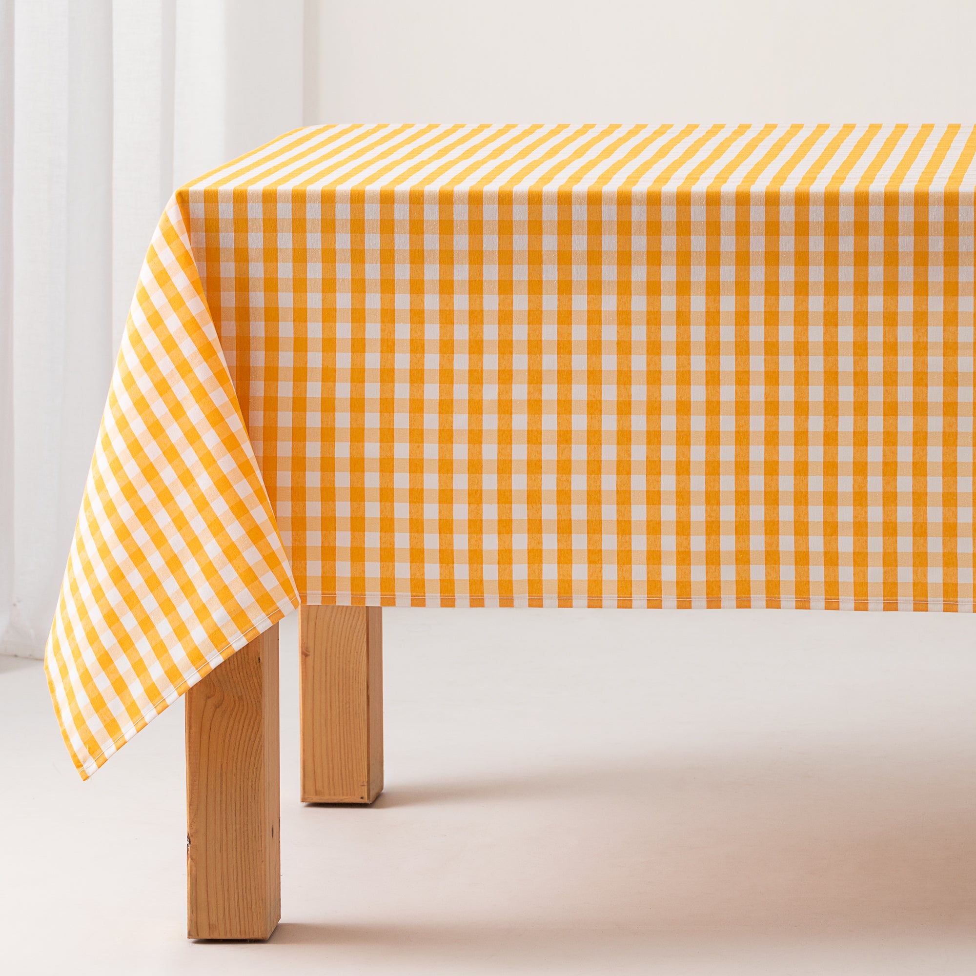Obrus plamoodporny vichy z bawełny, miękki w dotyku, żółty 140x140 cm