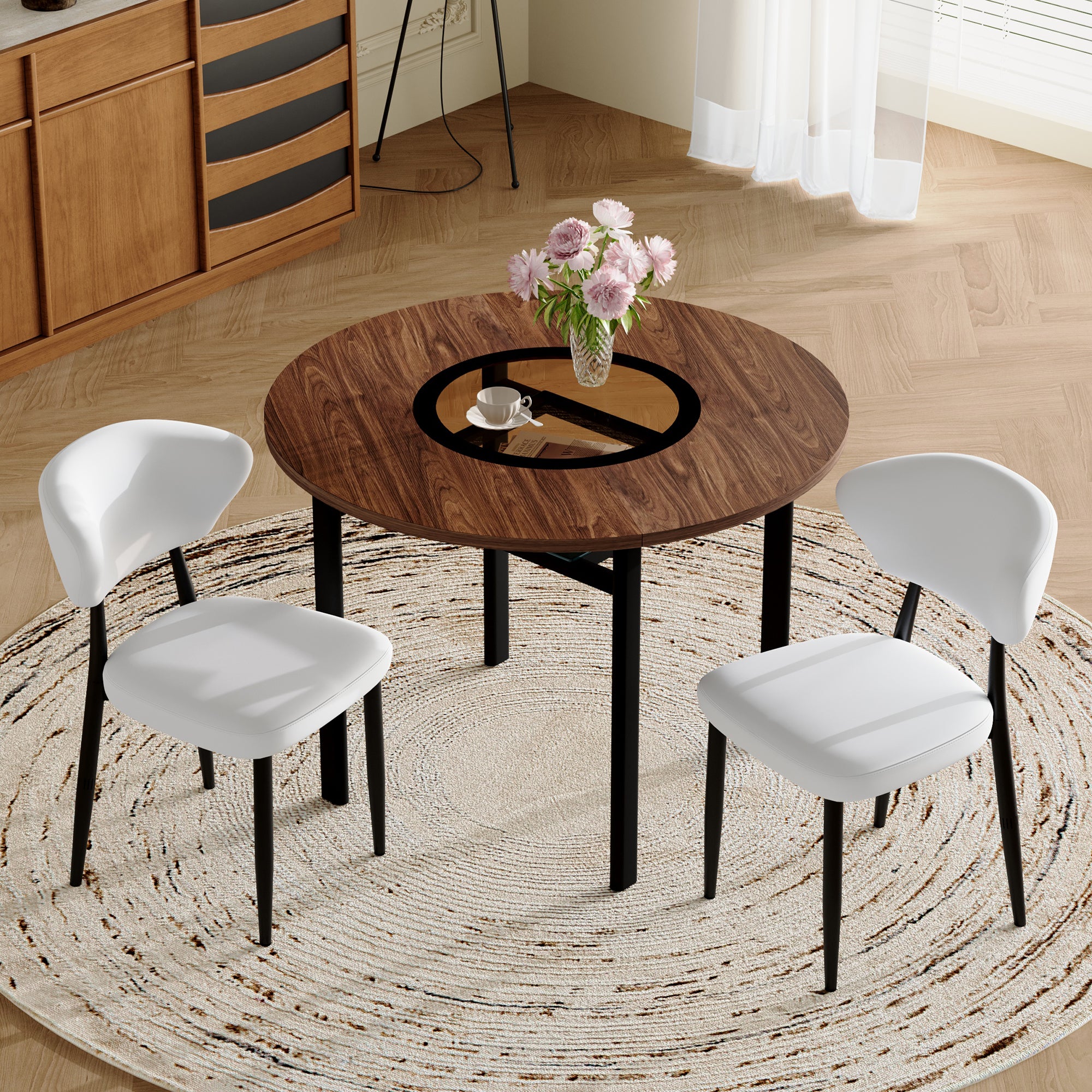Conjunto de mesa redonda de 100 cm efecto madera con inserto de cristal y 2 sillas blancas de pu con patas de metal.