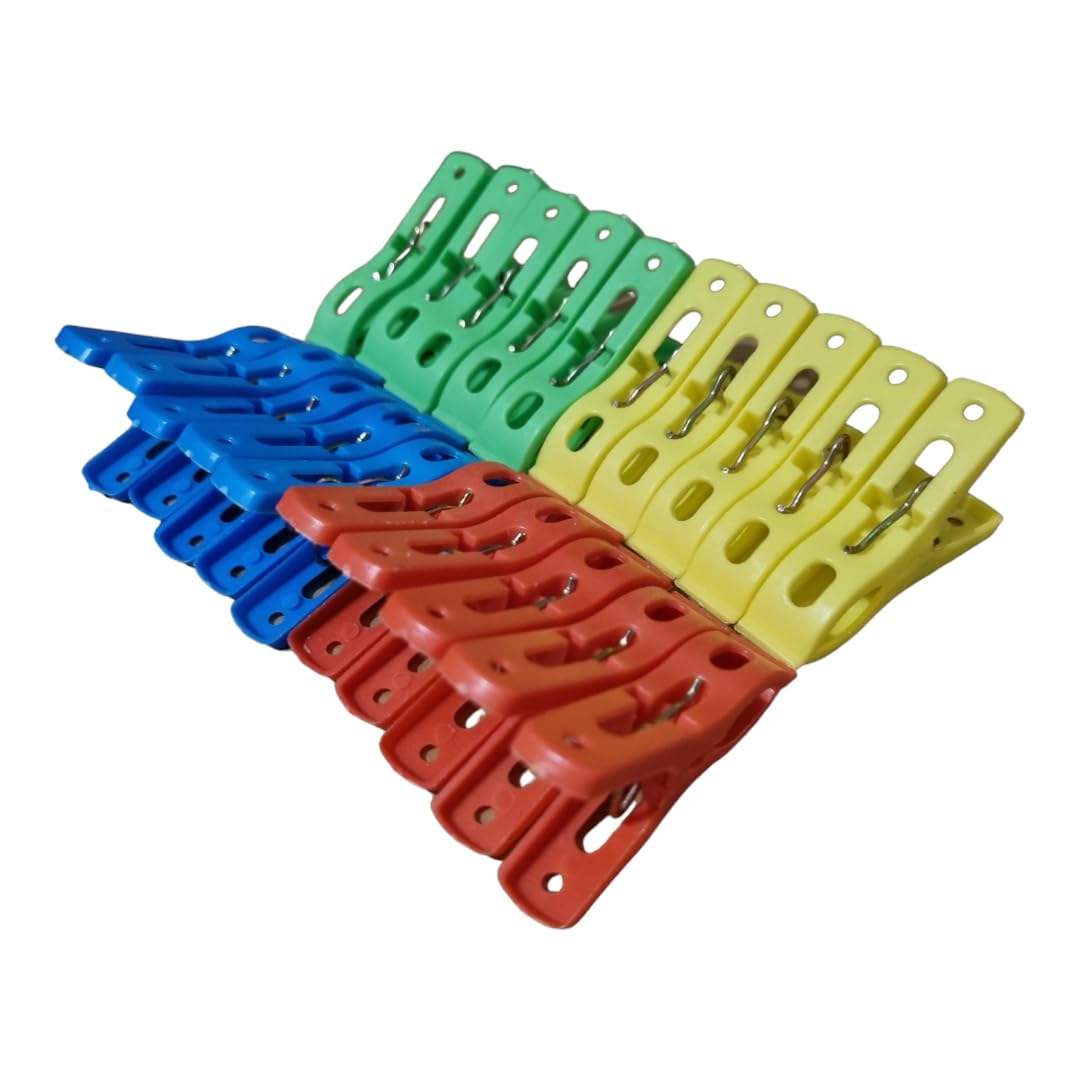 Di Mollette Da Bucato Di Plastica Colorate Multi Su Un Filo Stendiabiti Di Mollette Da Bucato Di Plastica Colorate Multi Su Un Filo Stendiabiti