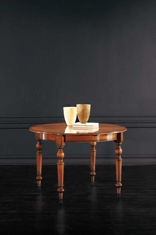 TAVOLO ROTONDO IN LEGNO ALLUNGABILE CON GAMBE TORNITE NOCE