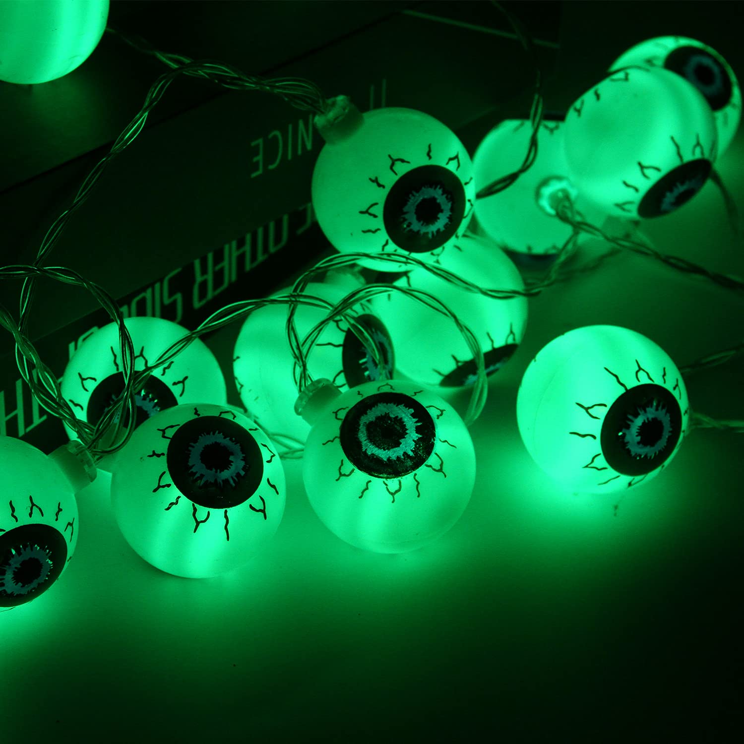Sznur świetlny z gałkami ocznymi na Halloween, 9,84 stopy, 20 zielonych diod LED zasilanych bateryjnie do dekoracji na Halloween (zielony)