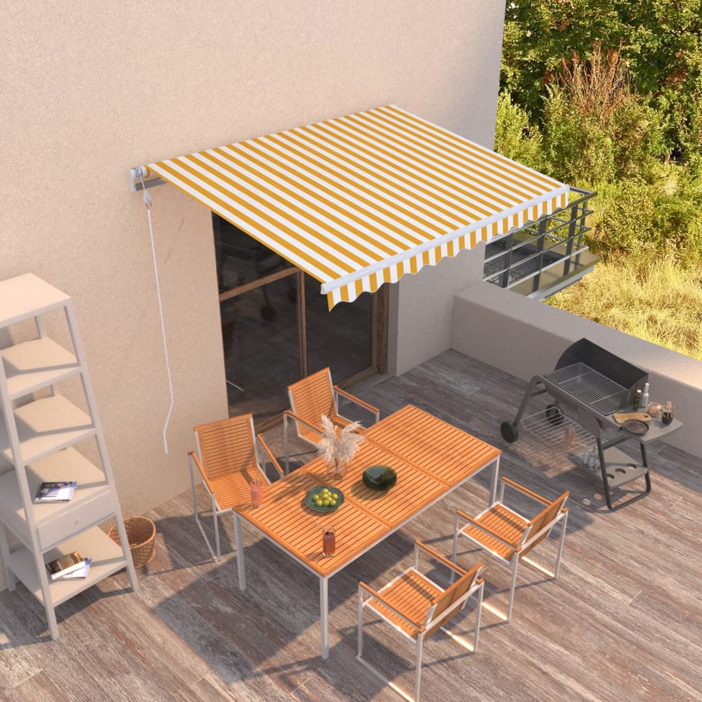 Toldo manual retráctil de 350x250 cm, amarillo y blanco.