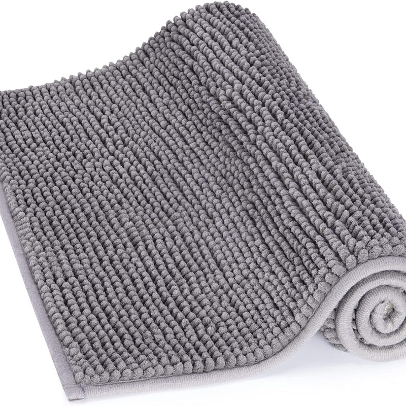 Mata łazienkowa antypoślizgowa i chłonna o wymiarach 80 cm x 50 cm, wykonana z szarej mikrofibry szenilowej.