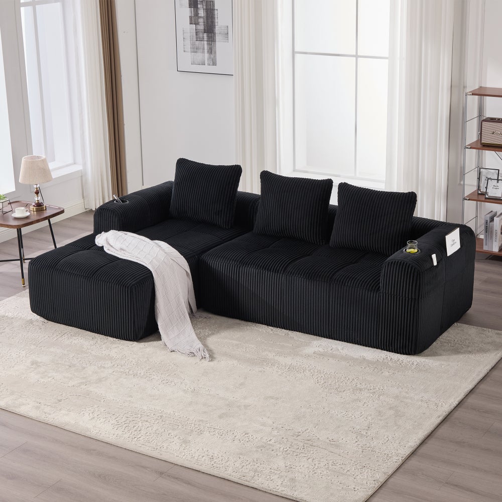 Kompaktowa modułowa sofa z kordu z kieszenią boczną i uchwytem na kubek, czarna