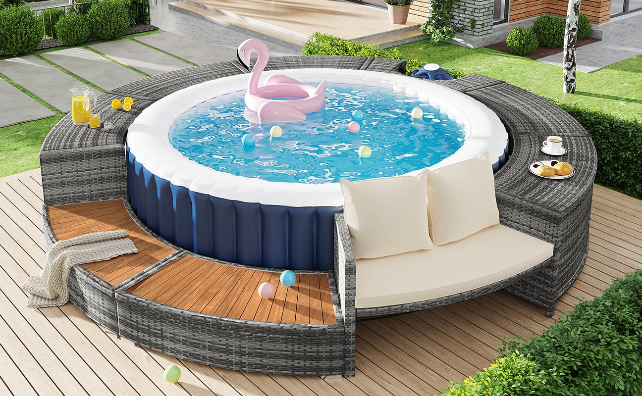 Arredo da giardino con divano rotondo in resina intrecciata