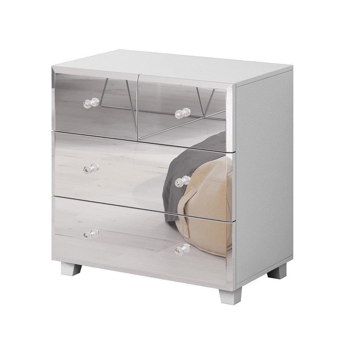 Commode 4 tiroirs corps blanc et façades recouvertes de miroirs collection LIVORA.
